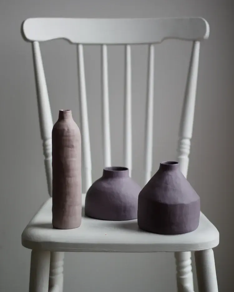 Hand-built porcelain vessel with pale celadon glaze