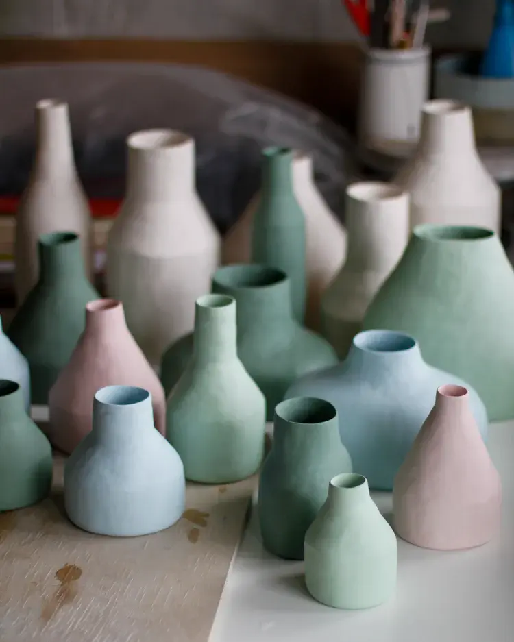 Tall hand-coiled porcelain vessel with satin finish