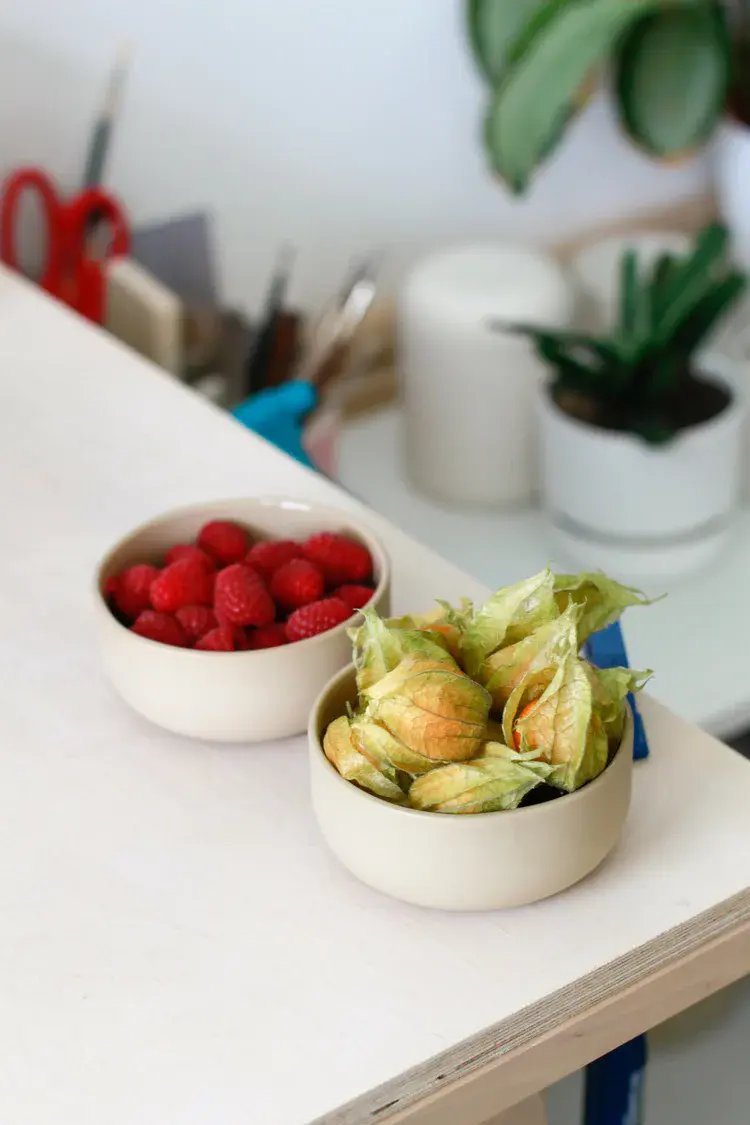 Collection of slip-cast vessels arranged before firing