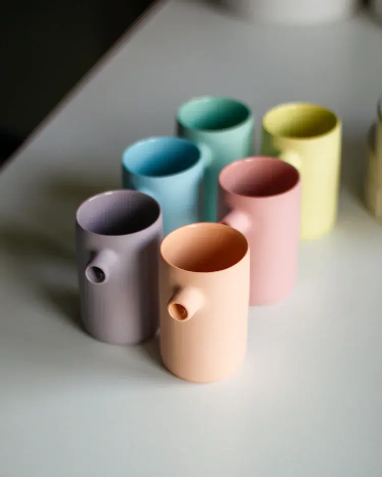 Slip-cast porcelain lidded jar in soft white glaze