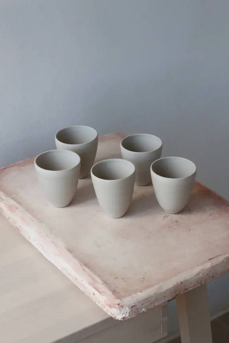 Hand-built stoneware cup with subtle speckled finish