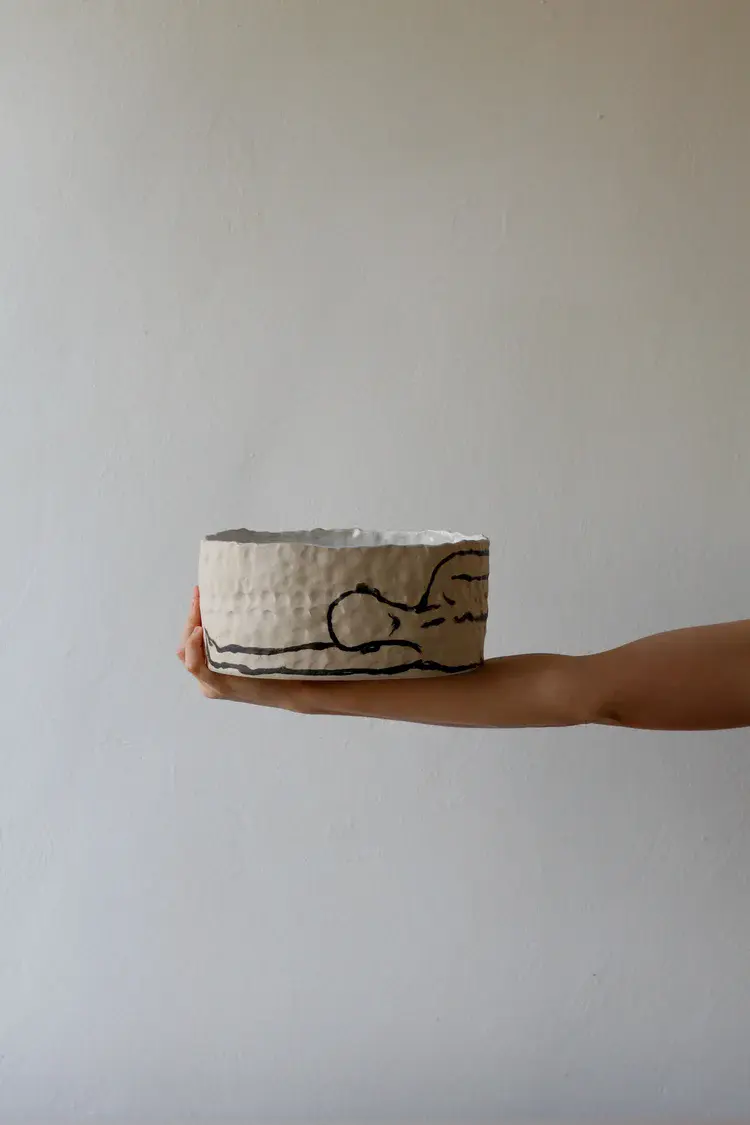 Stoneware bowl detail showing coiling technique marks